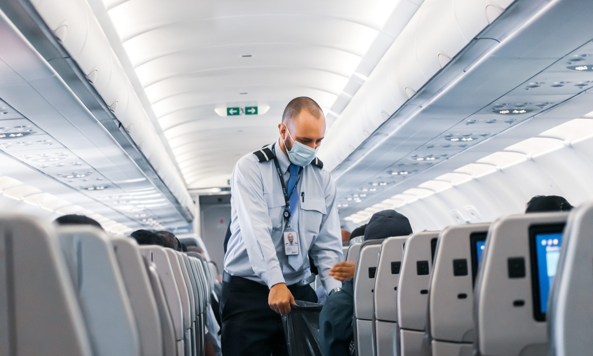 Flight attendant in cabin